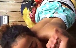 Stunning black beauty blowing cock