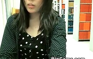 Asian undressing in library