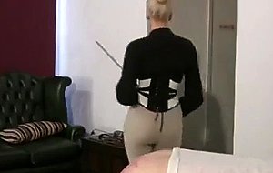 Blond mistress whips and canes slave intense