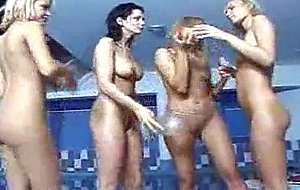 Group Of Naked Girls Playing By The Pool