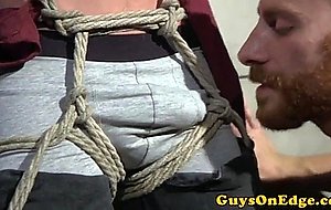 Blindfolded hunk edged with toys and sucking