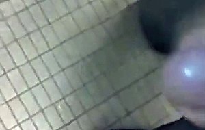 Guy blows and swallows in a public washroom
