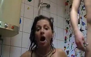 A guy   his gf to sex in the shower