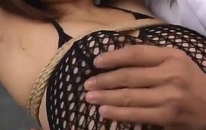 Megu busty in fishnet lingerie gets sex toy in asshole
