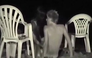 They catch a voyeur filming them having sex on the beach and taking her cherry