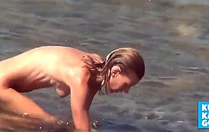 Naked beach babe with killer body  
