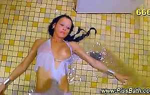 Hoe bathes in piss in bathroom