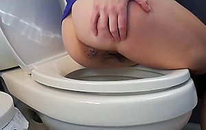 Hot woman with perfect ass shitting in the toilet