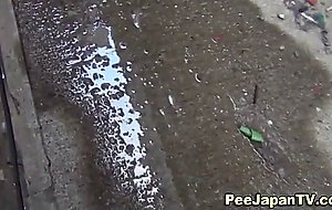 Japanese ladies pissing in pee alley