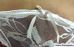 Busty ladyboy plays with her cock