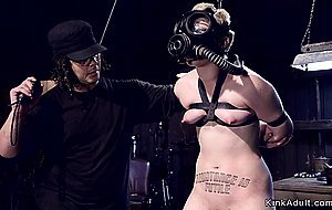 Blonde slave with gas mask tormented