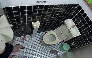 Asian babe having toilet sex with an old man