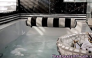 Busty teen masturbating in the bath