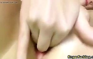 Lovely teen fingerfucking her pussy on webcam  