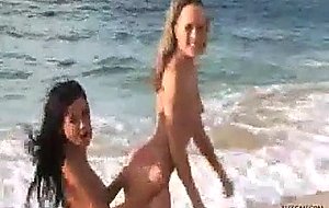 Amazing babes naked on beach drinking beer and fucking each others