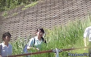 Goldenshower teens peeing outdoors  