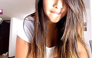 Sexy teen plays in front of her webcam