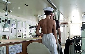 Busty brunette in sailor uniform