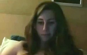 Teen spreads her legs and masturbates on webcam