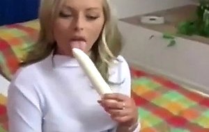 Hot blonde playing with a vibrator 2