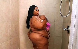 Some very phat ass slut taking a shower