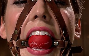 Gagged slave gets anal hooked