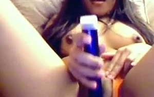 Asian beauty masturbating on webcam