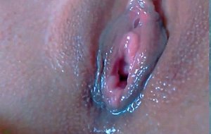 Horny babe fingering her wet pussy up close