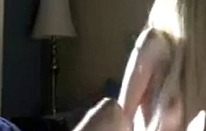 Slim blonde masturbating while home alone