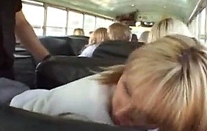 Blonde school girl and asian guy in bus
