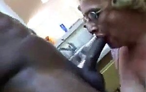 Old mom blows black cock in the kitchen