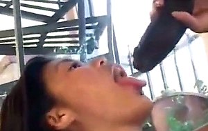 Slimy deepthroat asian on a big black cock