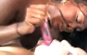 Black lesbian dominates white girl with a toy roughly