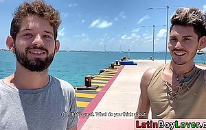 Latin guys celebrate gay pride on the beach outdoor