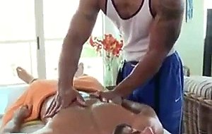 Rubbed down and sucking on massage table