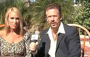 Busty blonde and reporter