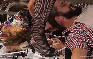 Porn shop owner in latex pegging man