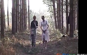 Sara and Jade strip in the woods