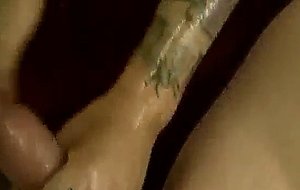 Oiled up tattooed chick gets fucked