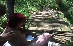 Redhead tranny fucks outdoor