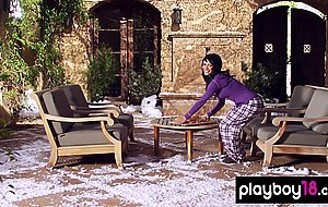 All natural ebony babe Kylie Johnson shows her big boobs at a snowy yard