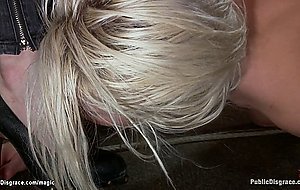 Bound blond fucked in public bar