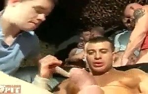 Orgy with Ashley Ryder in center being gang fucked by group of guys