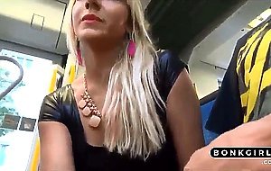 Girl jerks a lucky guy cock on the bus