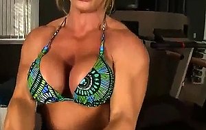 Mature female bodybuilder works out naked