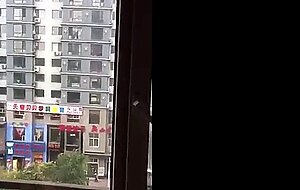 Filming his girl gets fucked at open window
