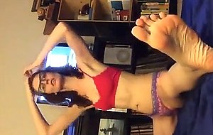 Yoga chick stretching and stripping