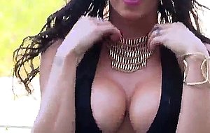 Jessica jaymes teases the camera, stripping down to reveal her big tits