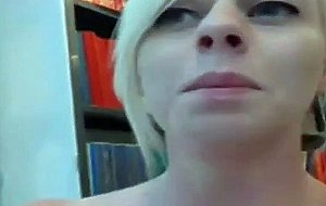 Girl toys her pussy in a public library