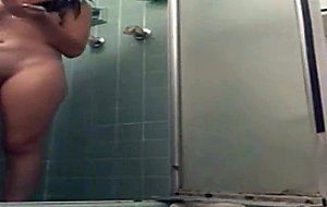 Teen tapes herself naked in the shower